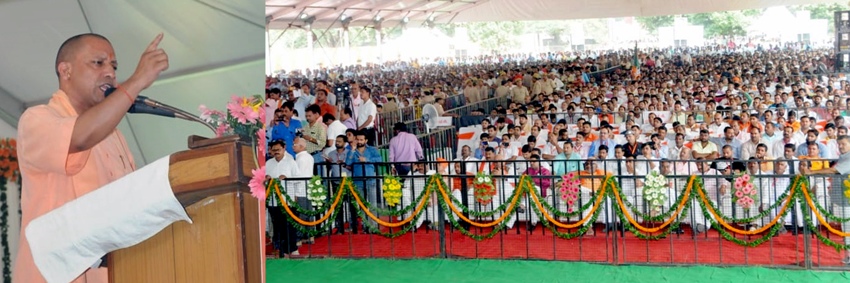 UPCM बस्ती में कार्यक्रम को सम्बोधित करते हुए
