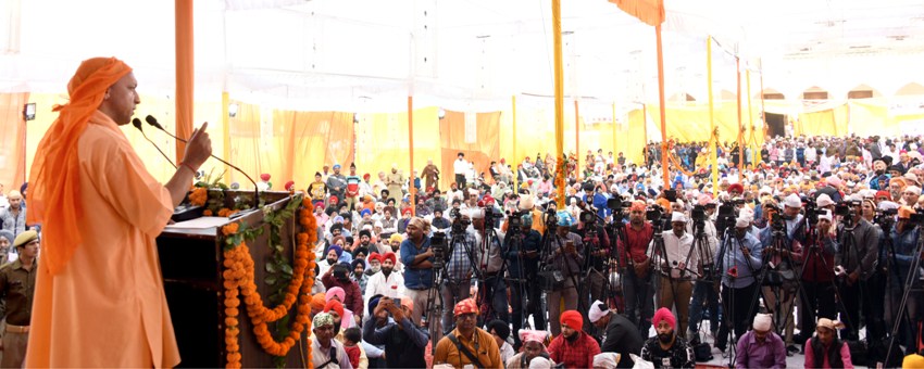 UPCM गुरू नानक देव के 550वें प्रकाश पर्व पर आयोजित प्रकाशोत्सव कार्यक्रम को सम्बोधित करते हुए
